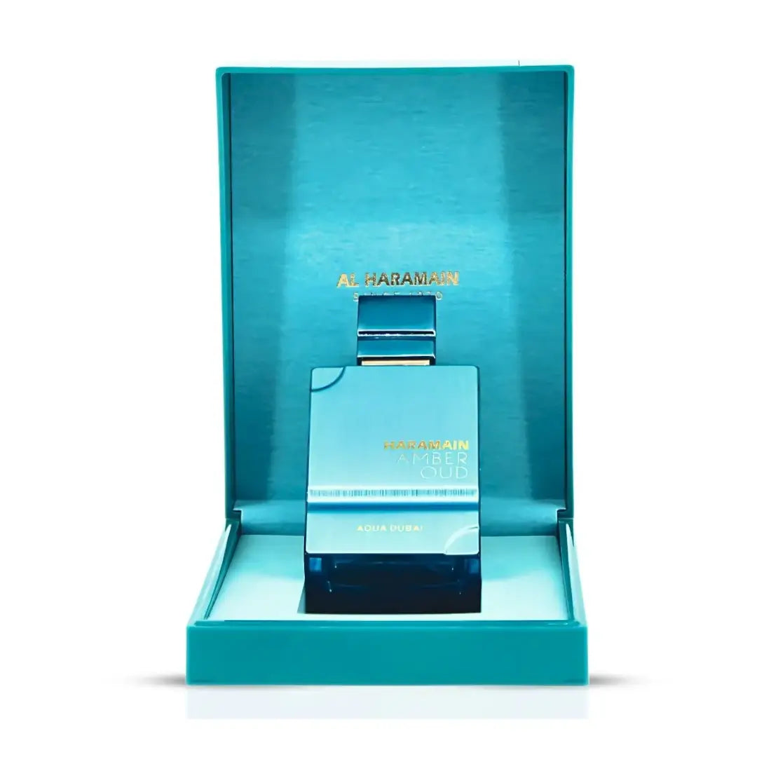 Amber Oud Aqua Dubai perfume bottle with packaging on a white background