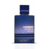 Blue perfume bottle labeled 'Haramain Amber Oud Dubai Night' on a white background