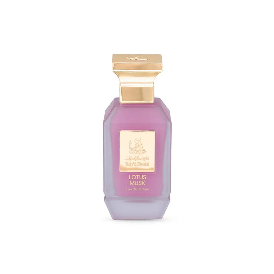 Perfume bottle labeled 'Lotus Musk' by Taif Al Emarat with a gold cap on a white background