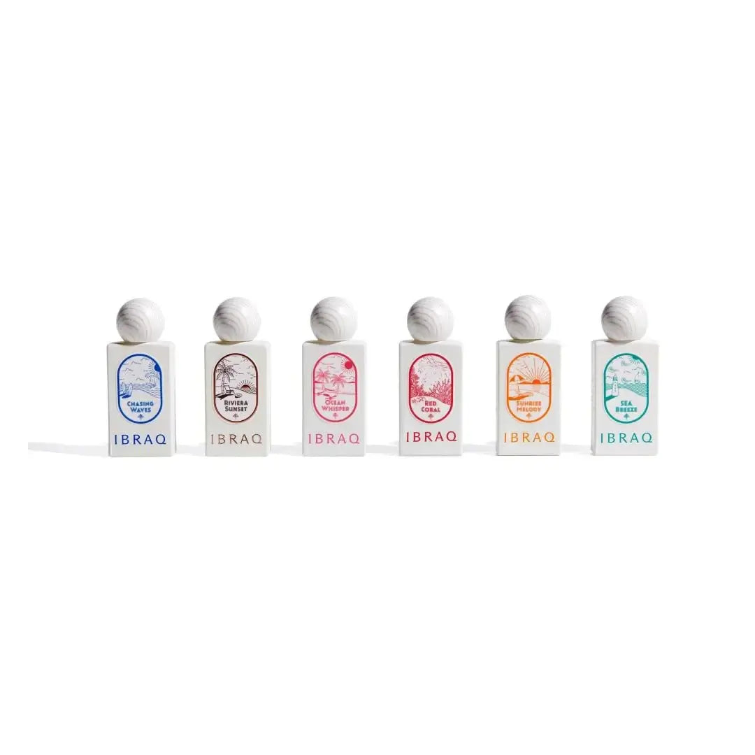 Set of six Mini Summer Collection Ibraq perfume bottles with different colored labels on a white background