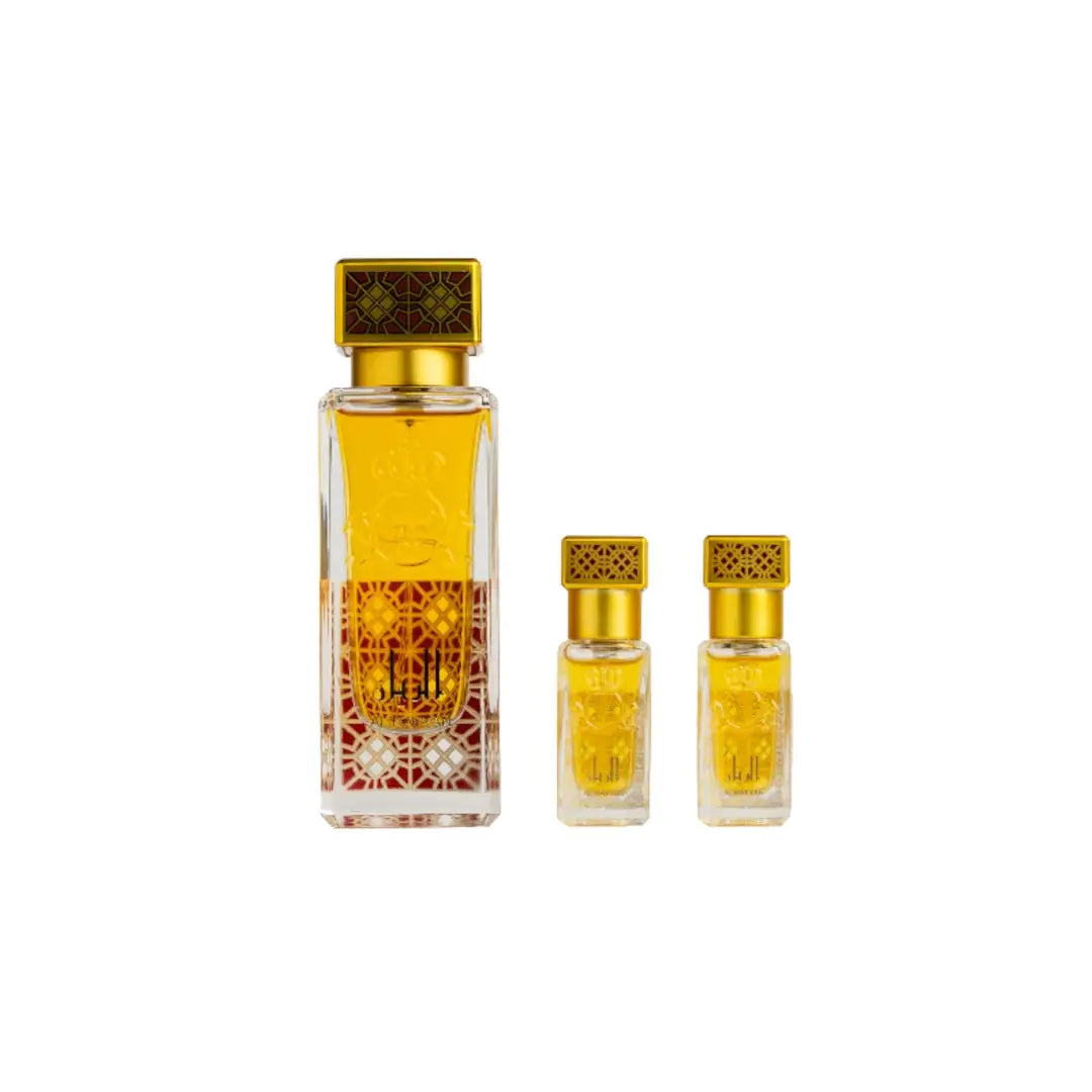 'Al Rayyan' by Al Jazeera Perfumes Set of three perfume bottles with gold caps on a white background