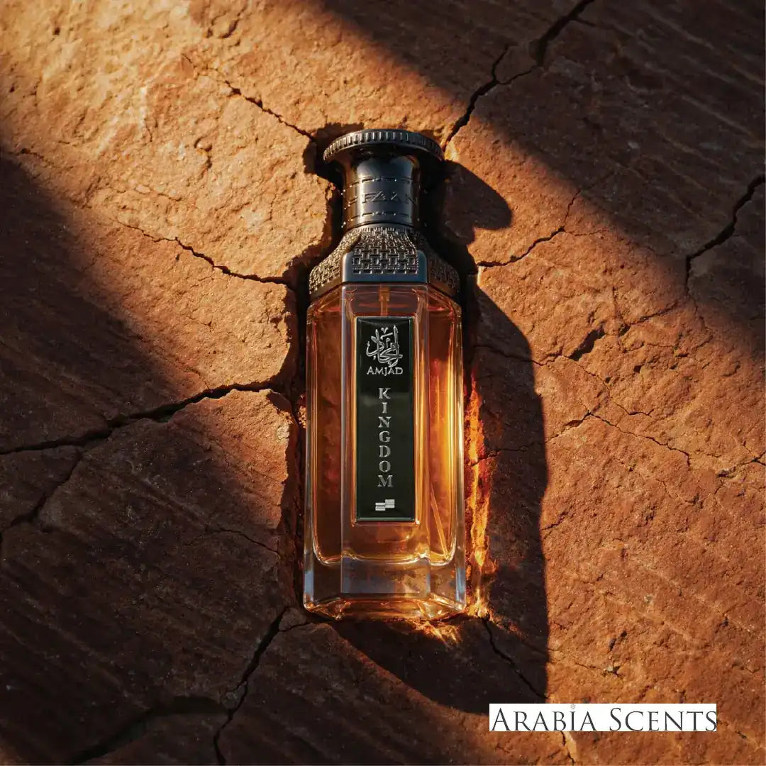 Amjad Kingdom Perfume bottle on a sand background branded Faan Perfumes featured on 'ArabiaScents'