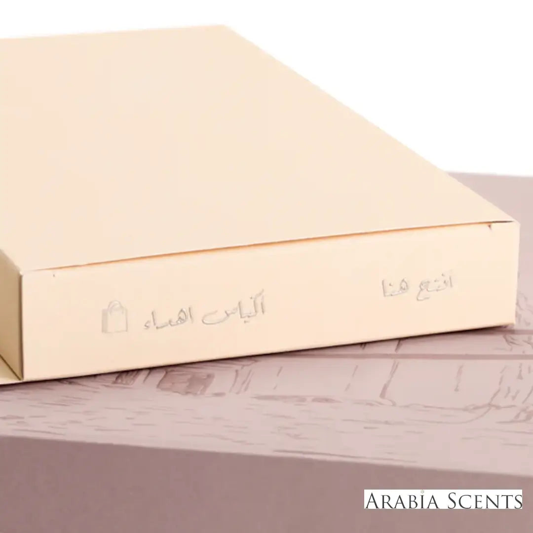 'Arrogate Pink Collection' packaging on a white background with 'Assaf' branding featured by 'Arabiascents'