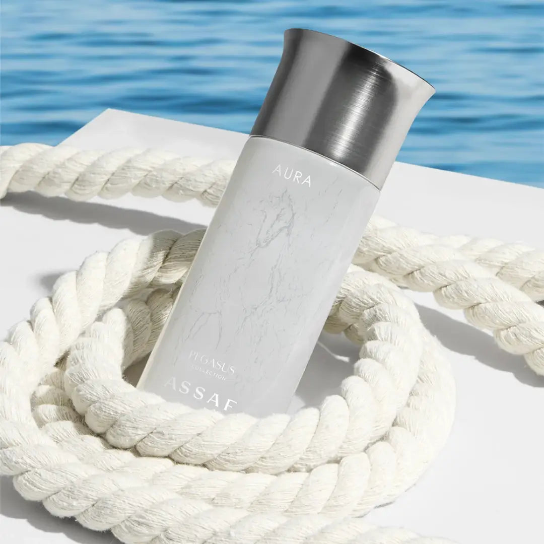 'Aura Pegasus' perfume bottle on a white rope with sea background with 'Assaf' branding
