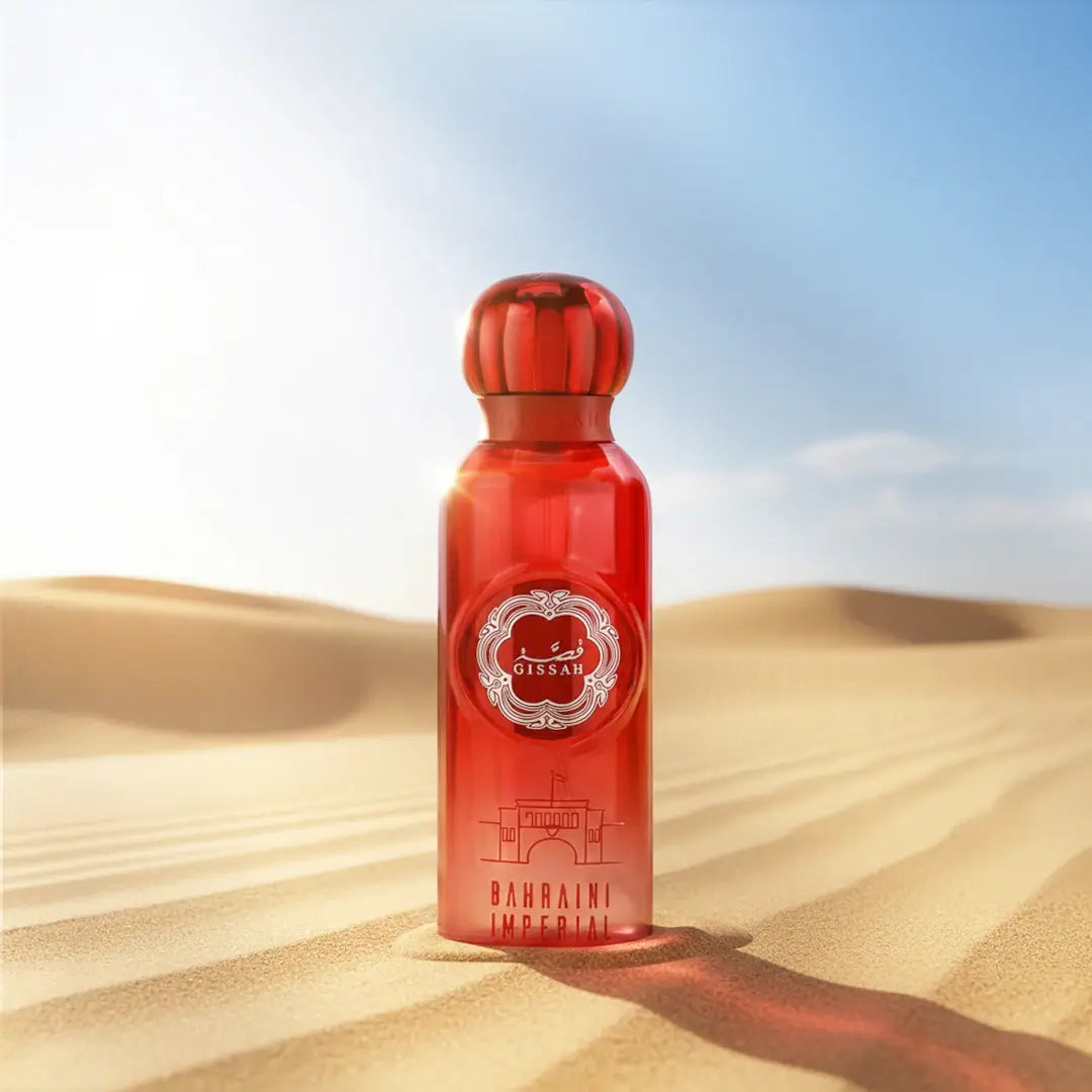 'Bahraini Imperial' Red perfume bottle with Gissah logo on sand dunes