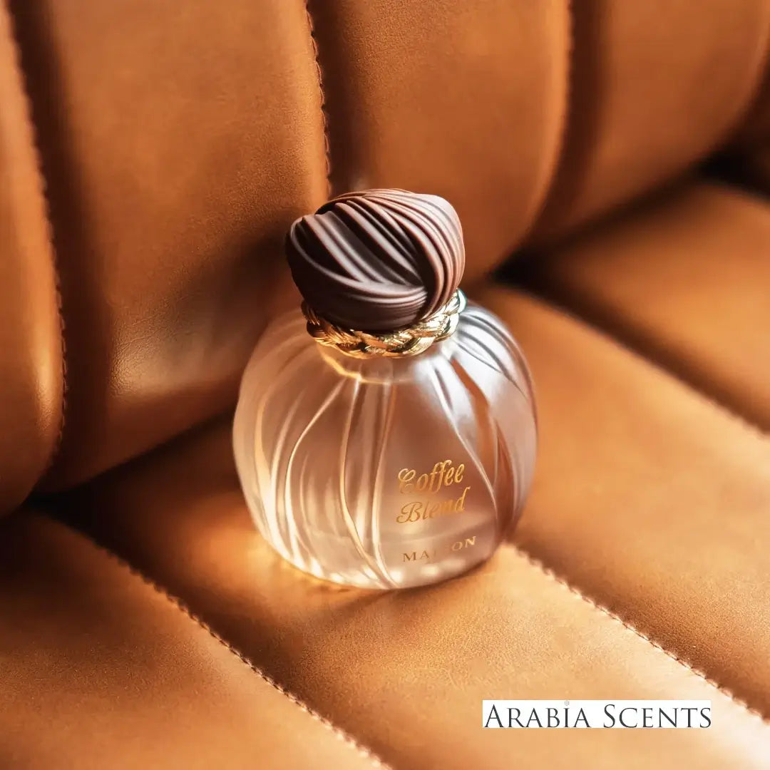 Perfume bottle labeled 'Coffee Blend' branded Maison Asrar featured on Arabia Scents on a brown textured background