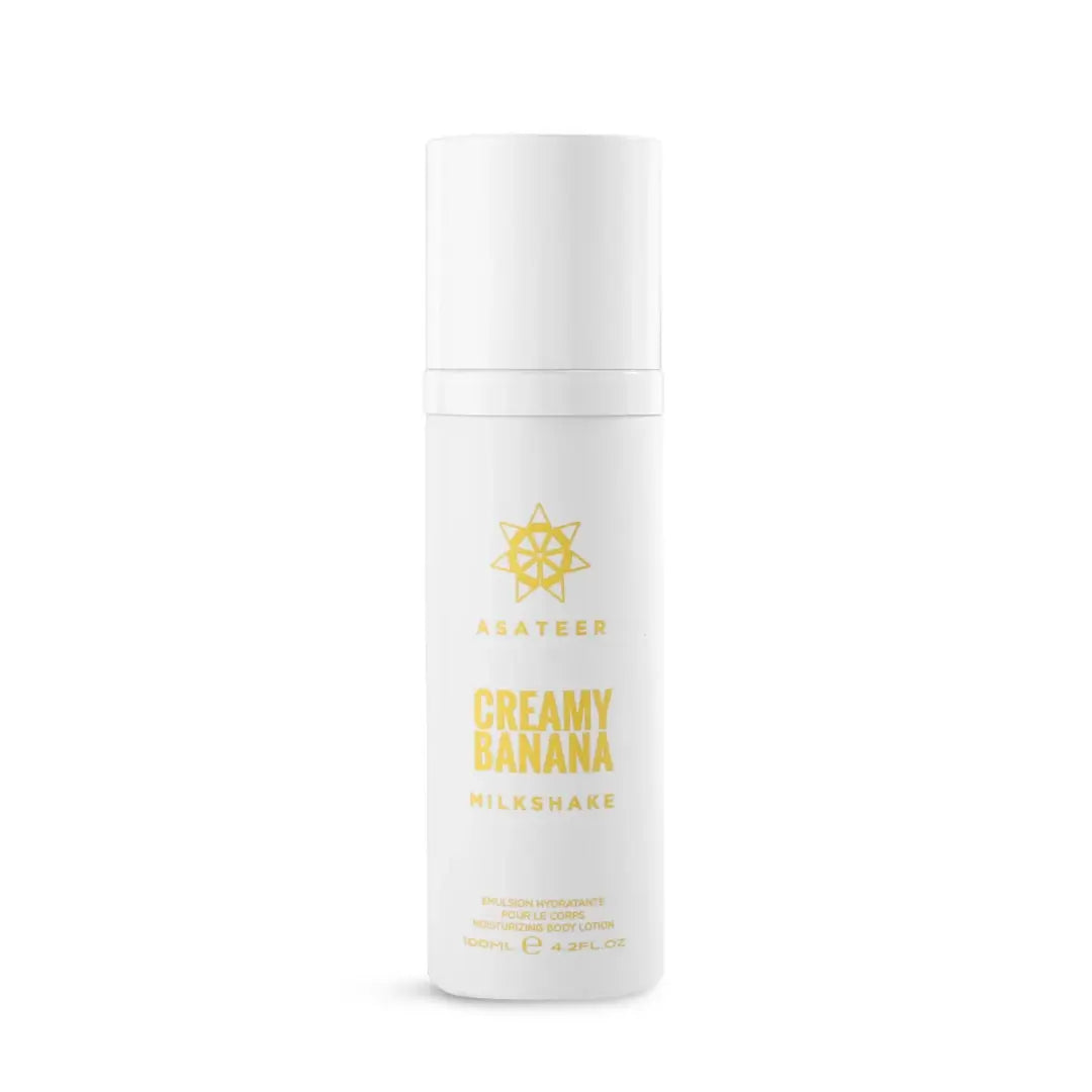 'Creamy Banana Milkshake Body Lotion Spray' bottle on a white background with 'Asateer' branding