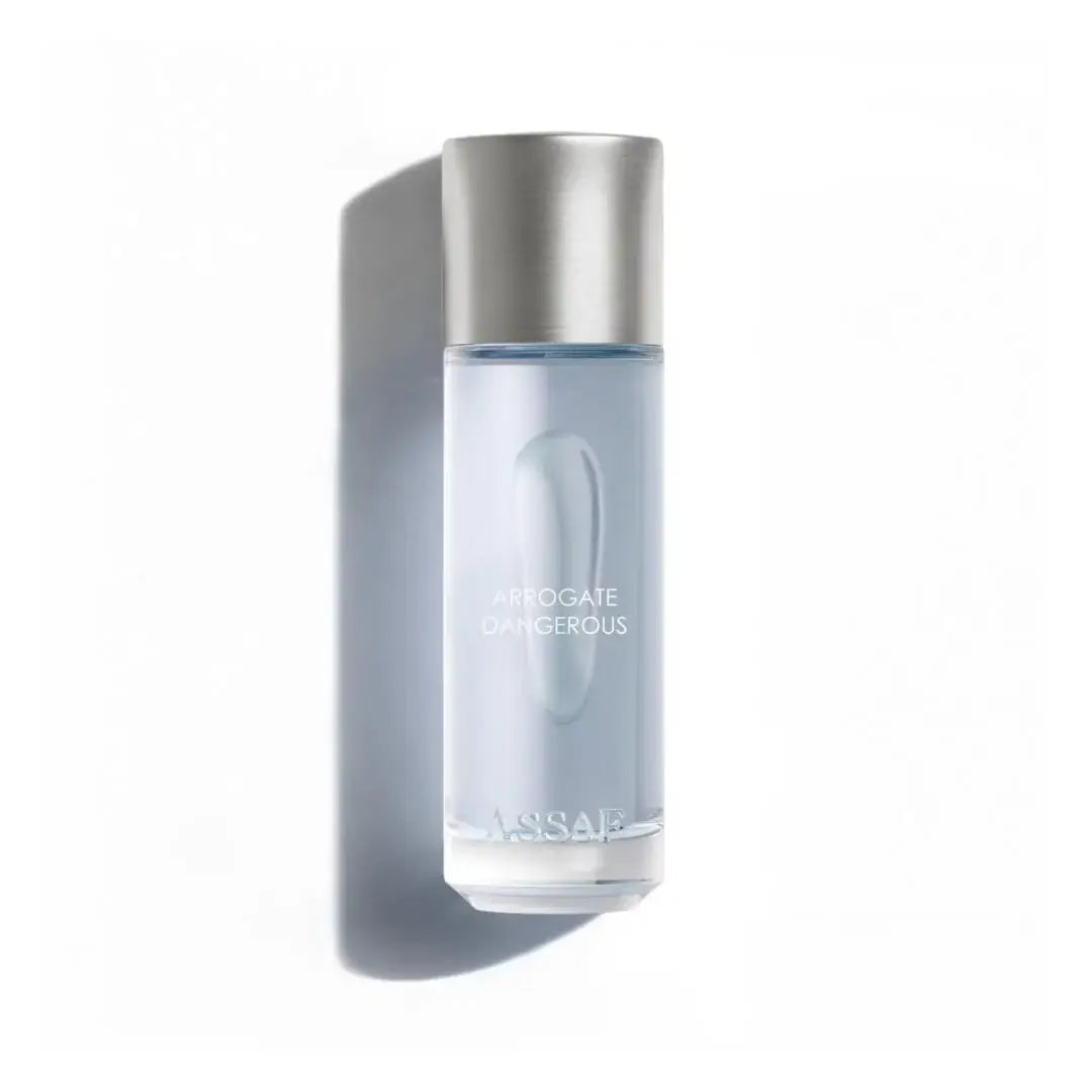 Perfume bottle labeled 'Dangerous Arrogate' on a white background with Assaf branding