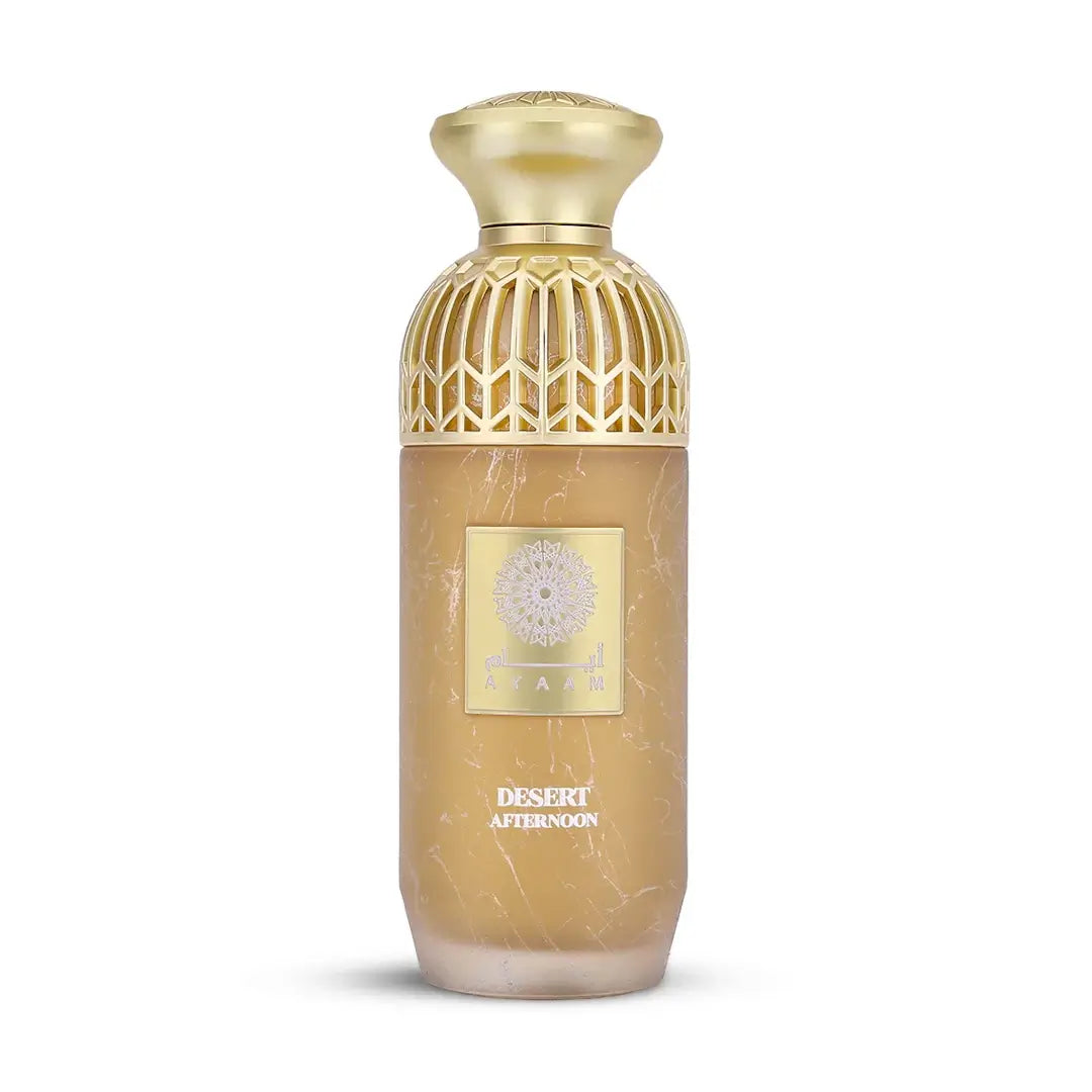 Gold and beige perfume bottle with 'Desert Afternoon' label on a white background with 'Ayaam' branding