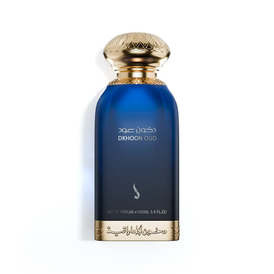 'Dkhoon Oud' Blue perfume bottle with gold cap on a white background by Dkhoon Al Emaratia