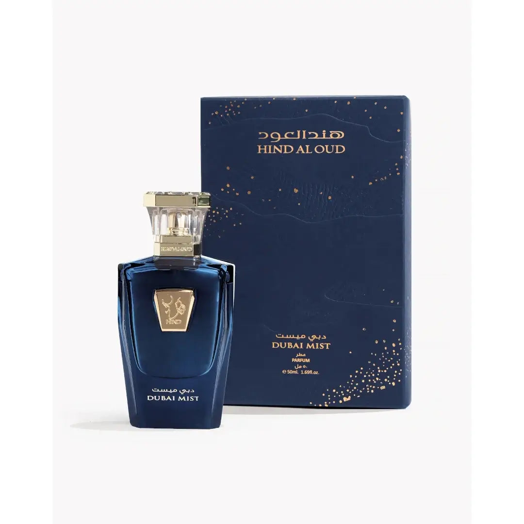 'Dubai Mist' perfume bottle & packaging in a white background with 'Hind Al Oud' branding
