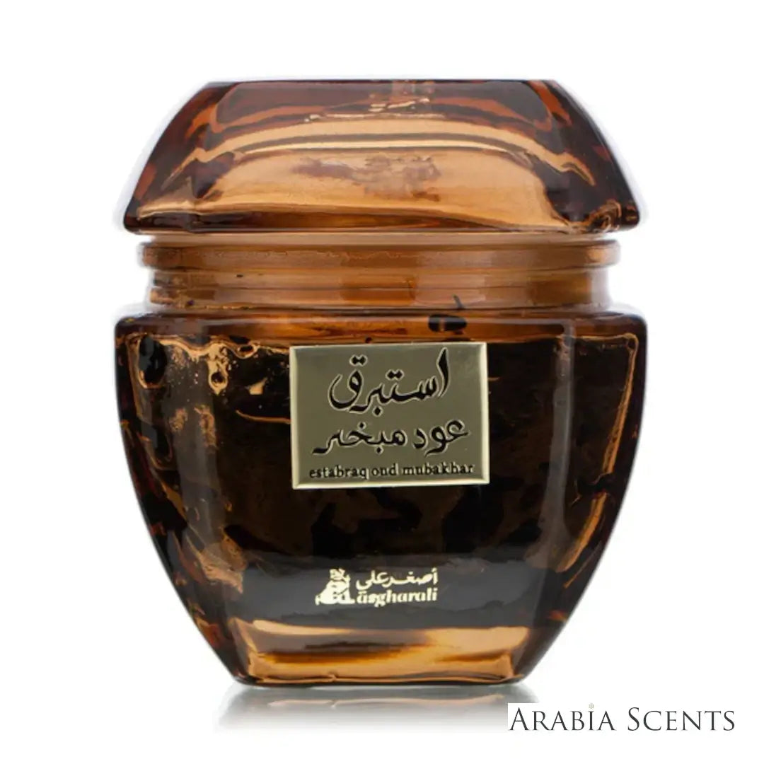 'Estabraq Oud Mubakhar' incense bottle on a white background with 'Asgharali' branding featured by 'Arabiascents' 