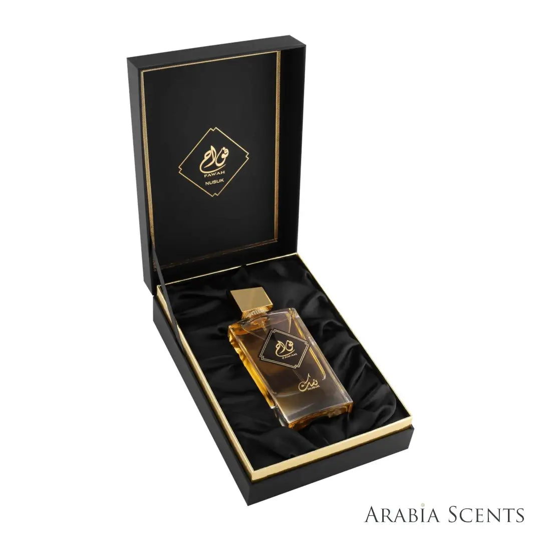 'Fawah' perfume bottle & packaging  on a white background with 'Nusuk' branding featured by 'Arabiascents'