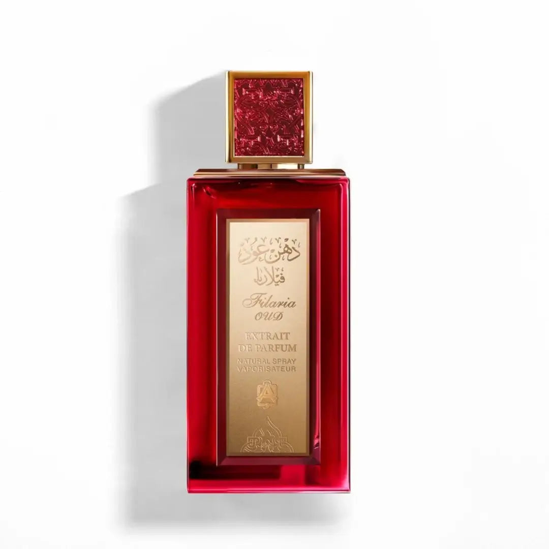 'Filaria Oud' Red and gold perfume bottle with intricate design on a white background branded Abdul Samad Al Qurashi