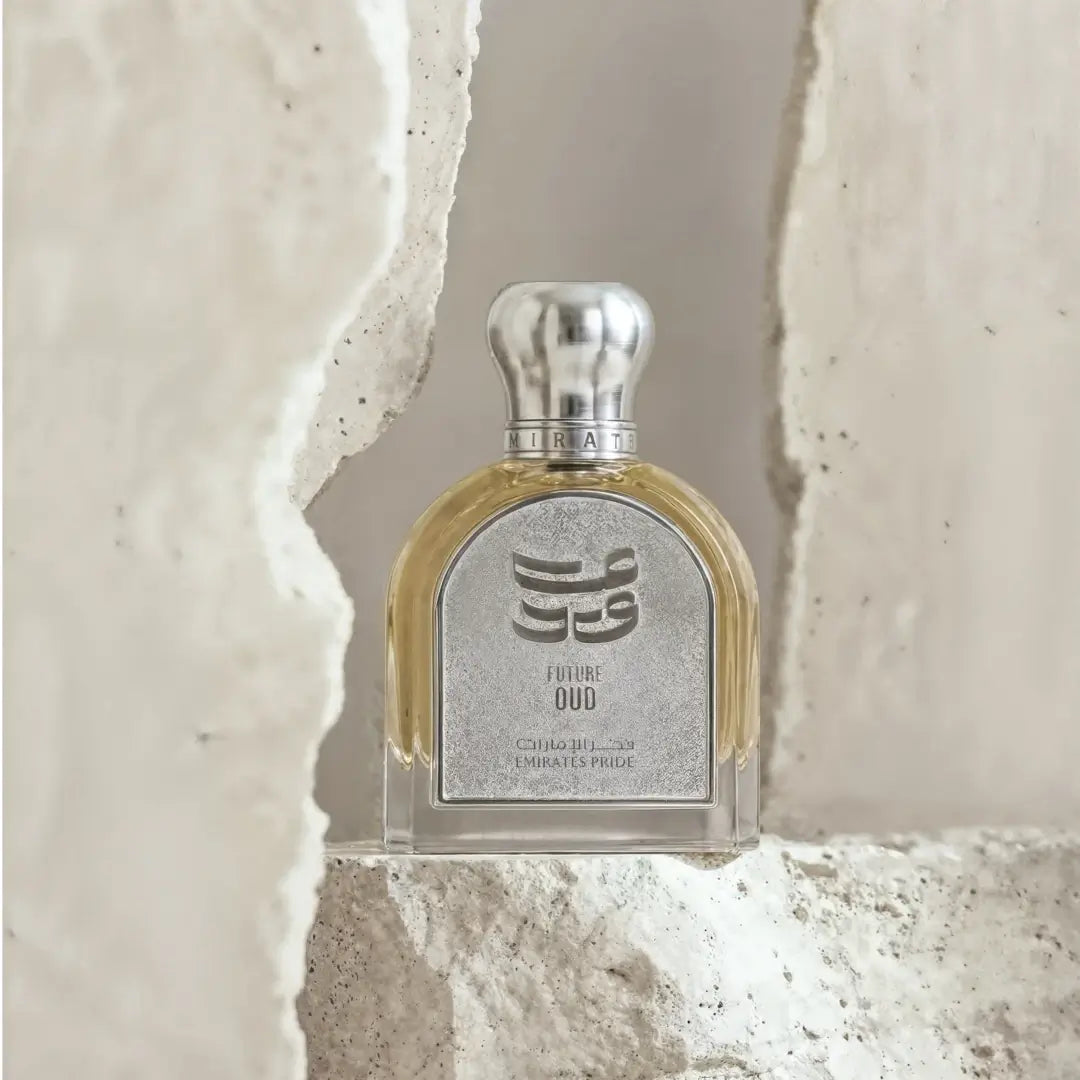 Perfume bottle labeled 'Future Oud' on a textured stone background with Taif Al Emarat branding