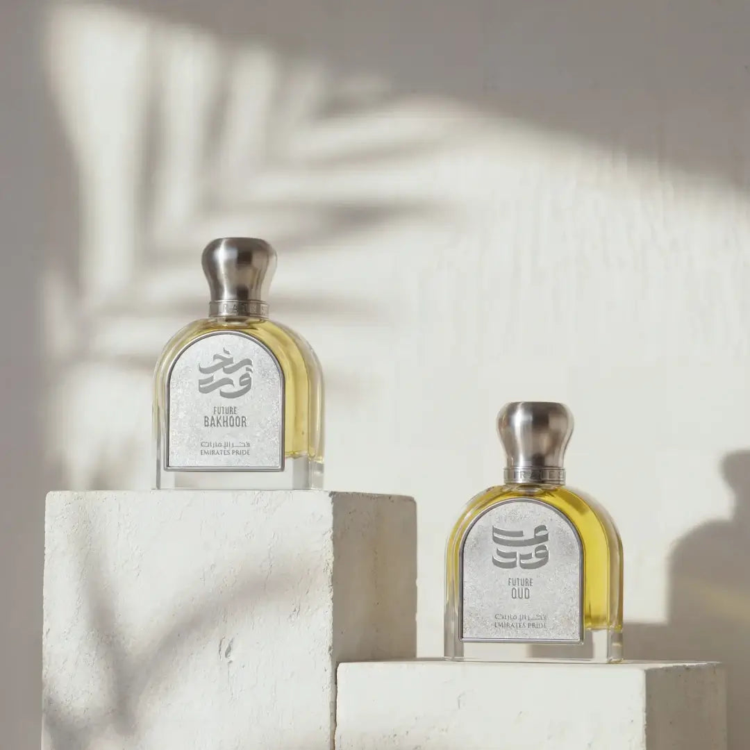 'Future Traditional Set' Two perfume bottles with silver caps and white labels on a light background with Emirates Pride branding