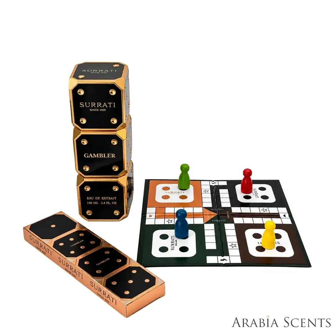 'Gambler' perfume bottle & a mini Ludo board game on a white background with 'Surrati' branding featured by 'Aabiascents'