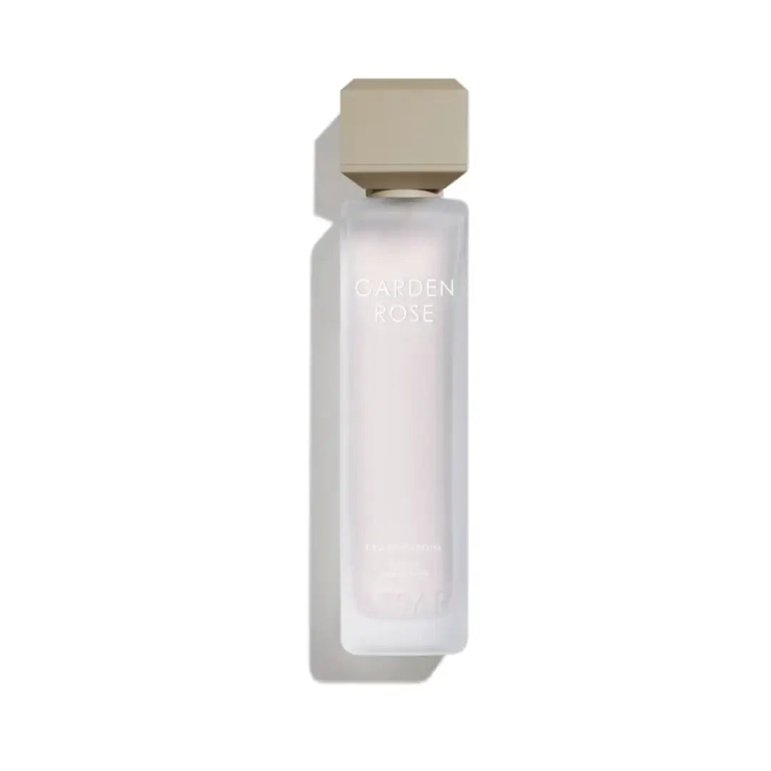 'Garden Rose' perfume bottle on a white background with 'Assaf' branding