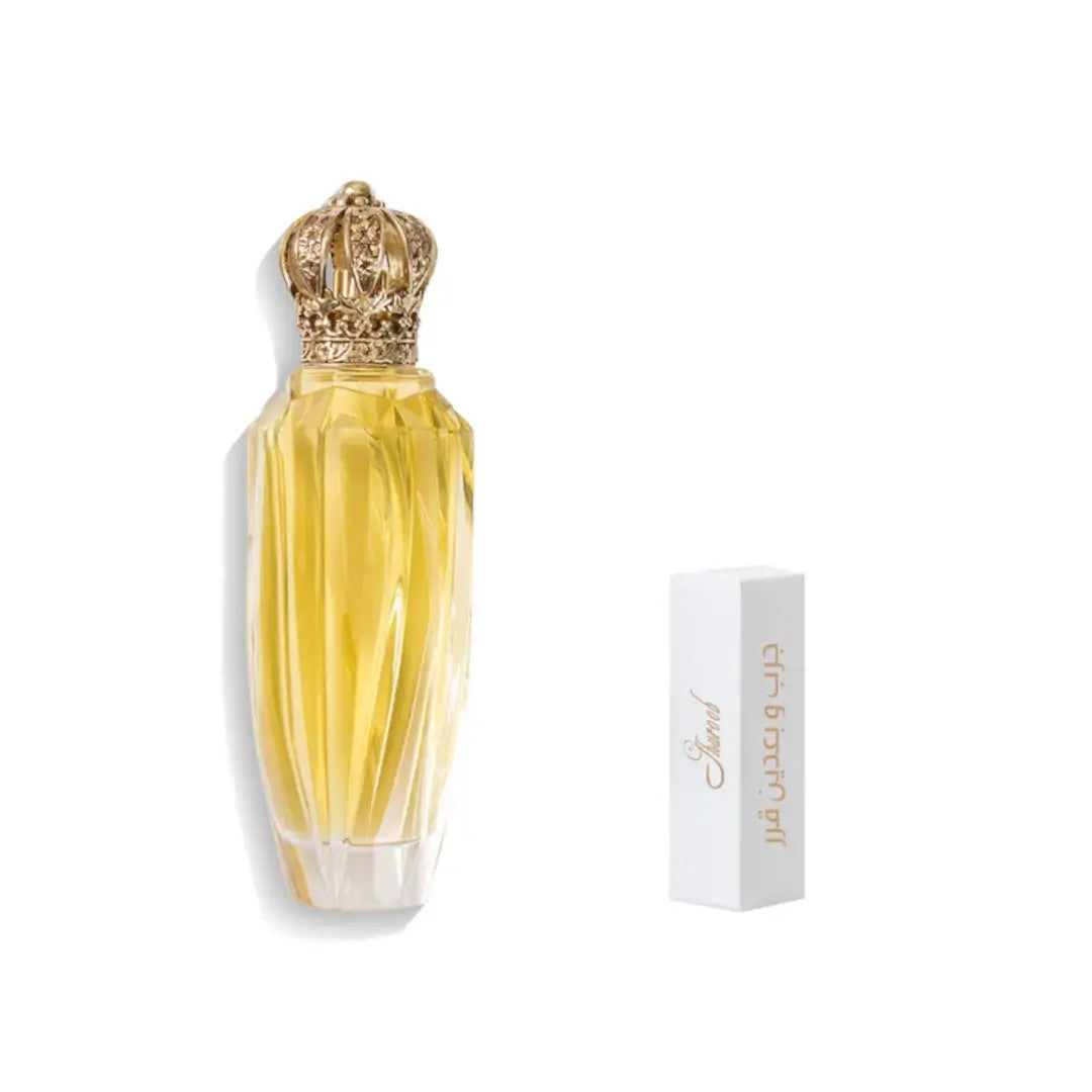 'Ghuroob' Perfume bottle with gold cap and packaging on a white background branded Junaid