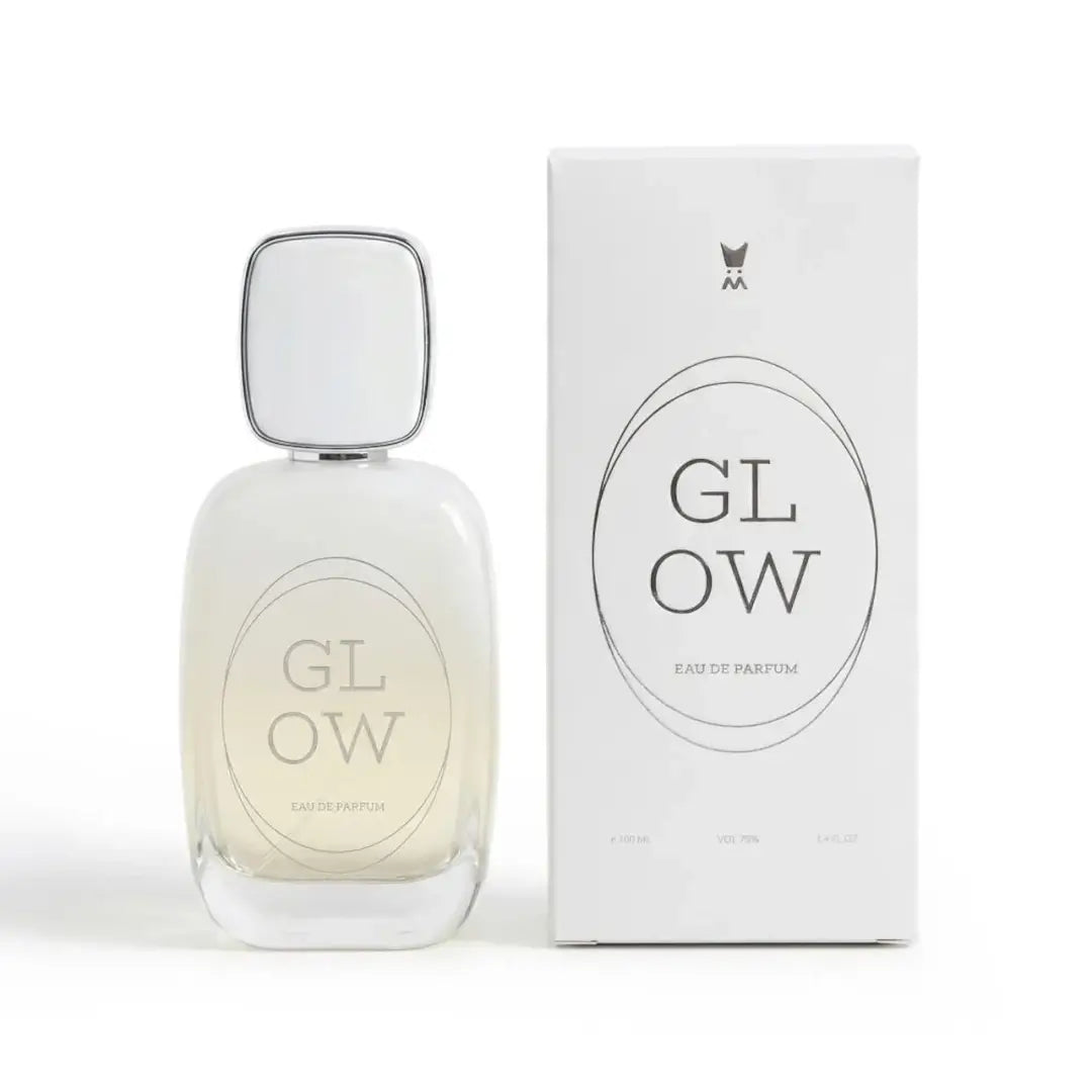 'Glow' perfume bottle & packaging on a white background with 'Al Majed Oud' branding