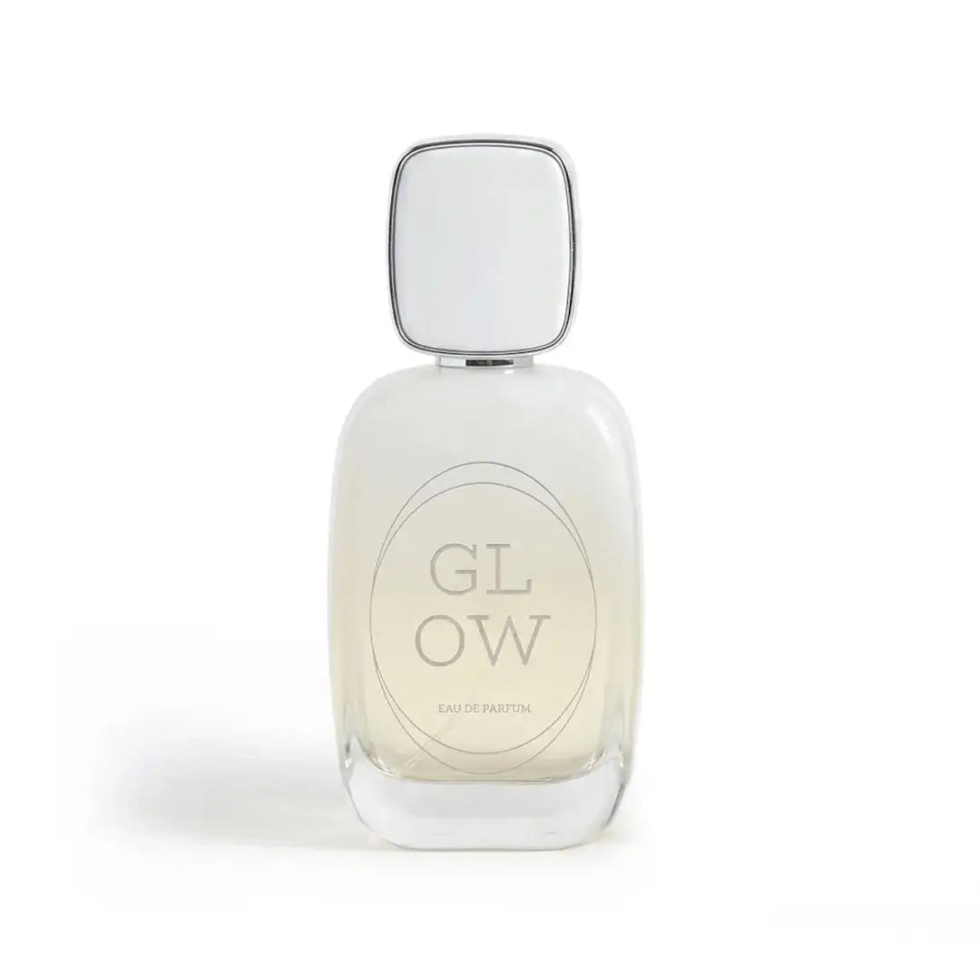 'Glow' perfume bottle on a white background with 'Al Majed Oud' branding