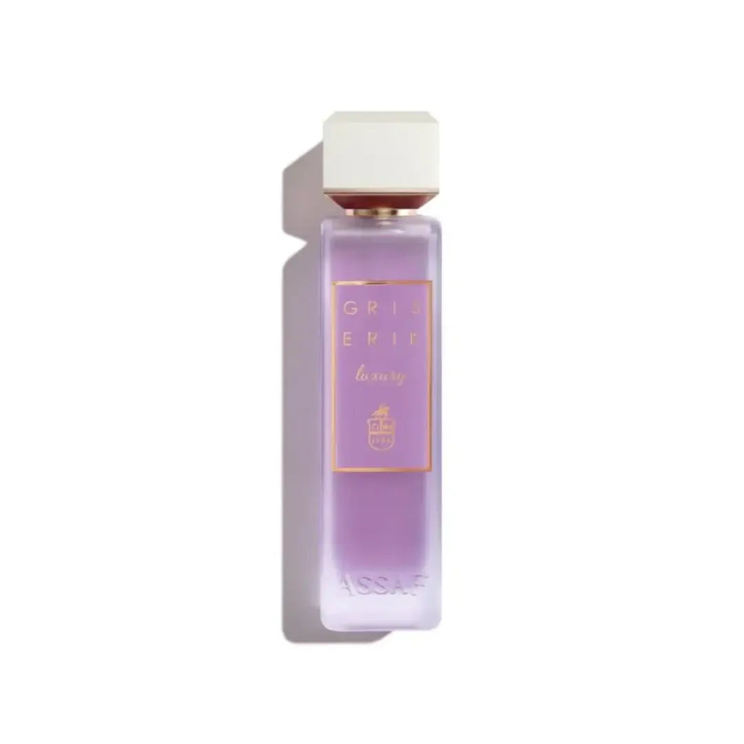 'Gris Erik Luxury' perfume bottle on a white background with 'Assaf' branding