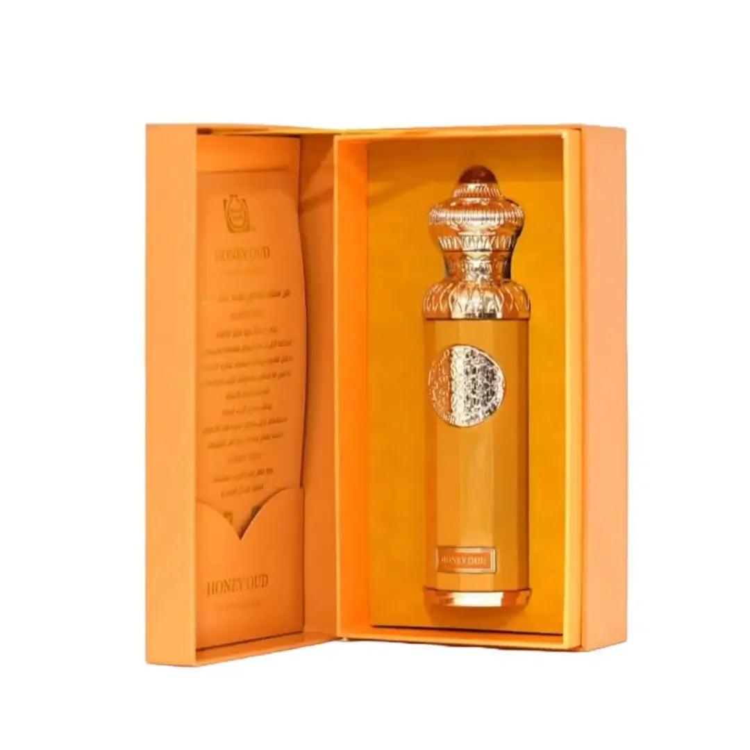 'Honey Oud' perfume bottle & packaging on a white background with 'Surrati' branding