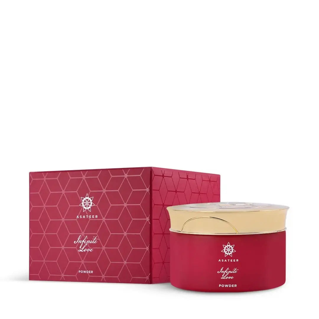Red 'Infinite Love Scented Body Powder' container with gold lid and geometric patterned box on a white background branded Asateer