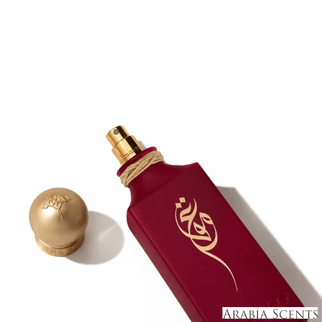 'AMAQ' perfume bottle on a white background with 'IBRAQ' branding featured by 'Arabiascents'