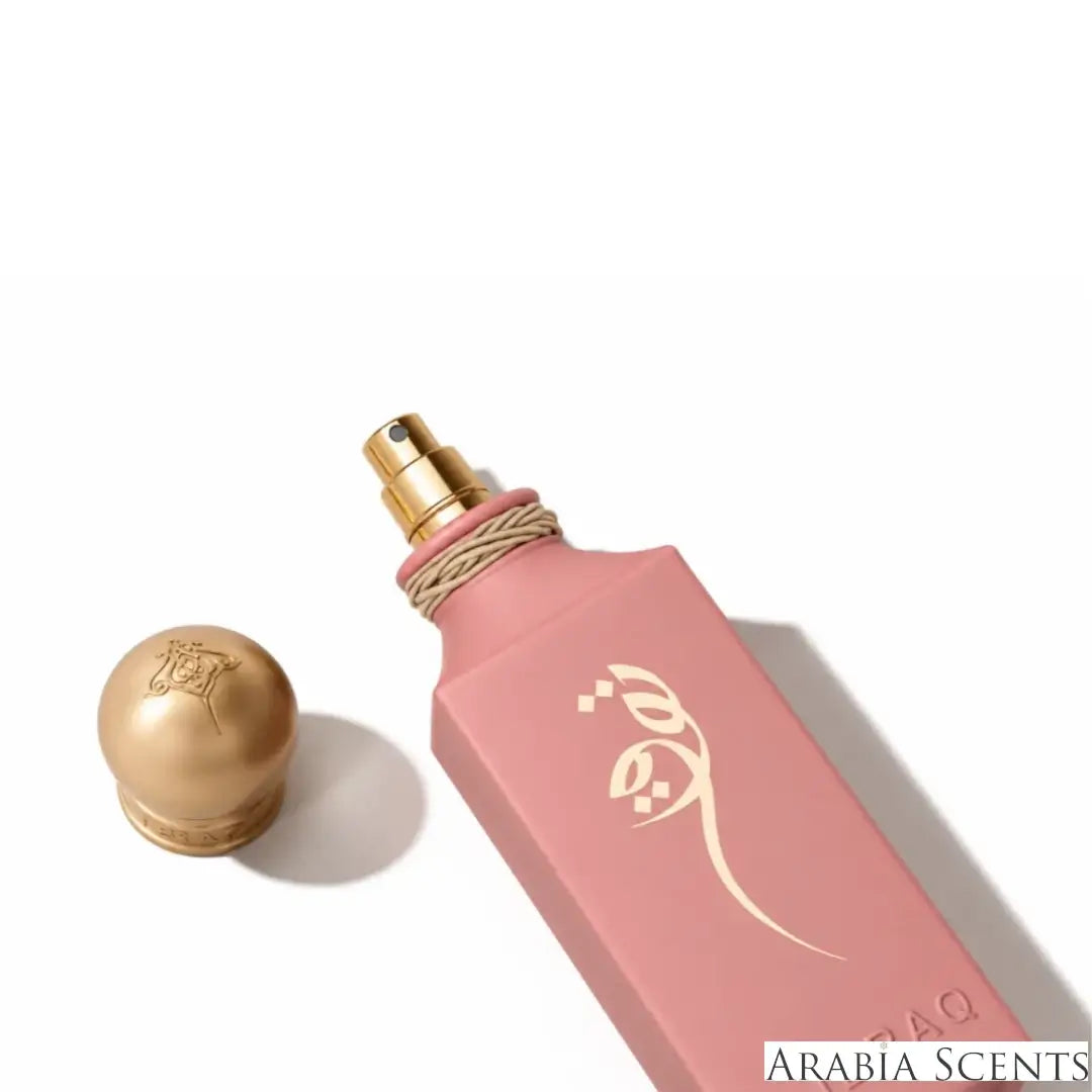 'TOQ' perfume bottle on a white background with 'IBRAQ' branding featured by 'Arabiascents'