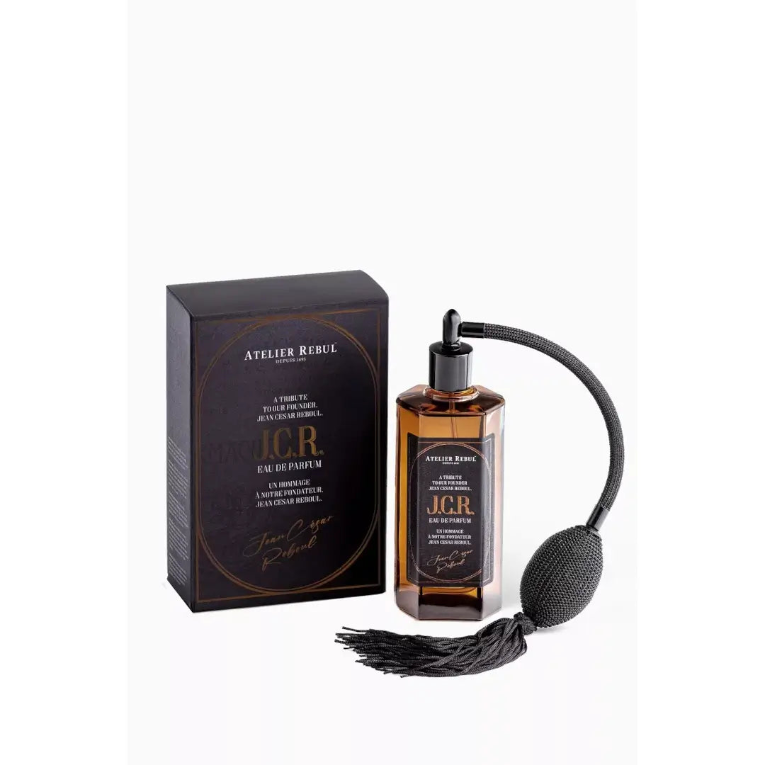 'J.C.R.' perfume bottle & packaging in a white background with 'Atelier Rebul' branding