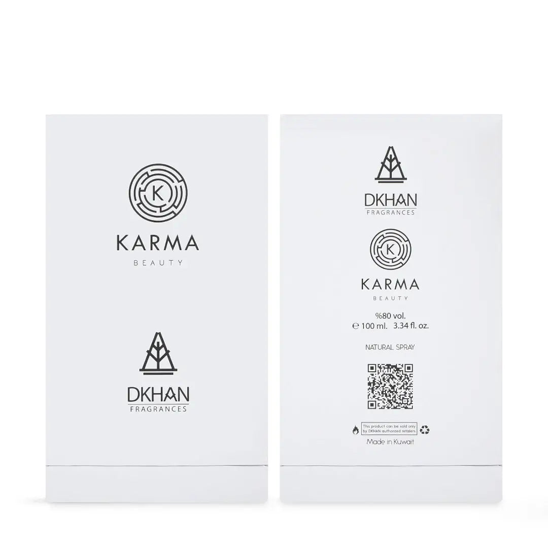 Two white boxes with Karma Beauty and DKHAN Fragrances branding on a white background