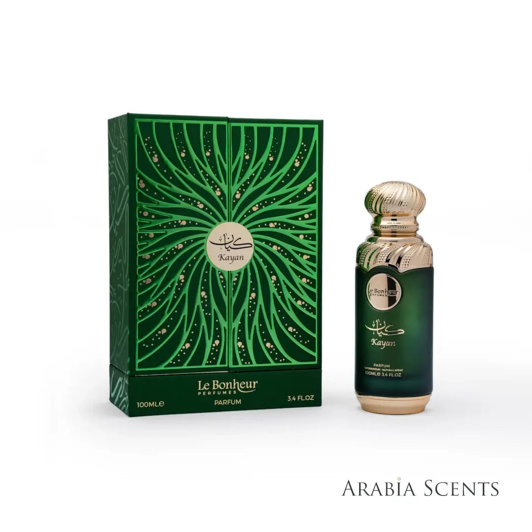 'Kayan' Green perfume bottle and packaging with 'Le Bonheur' branding on a white background featured by ArabiaScents