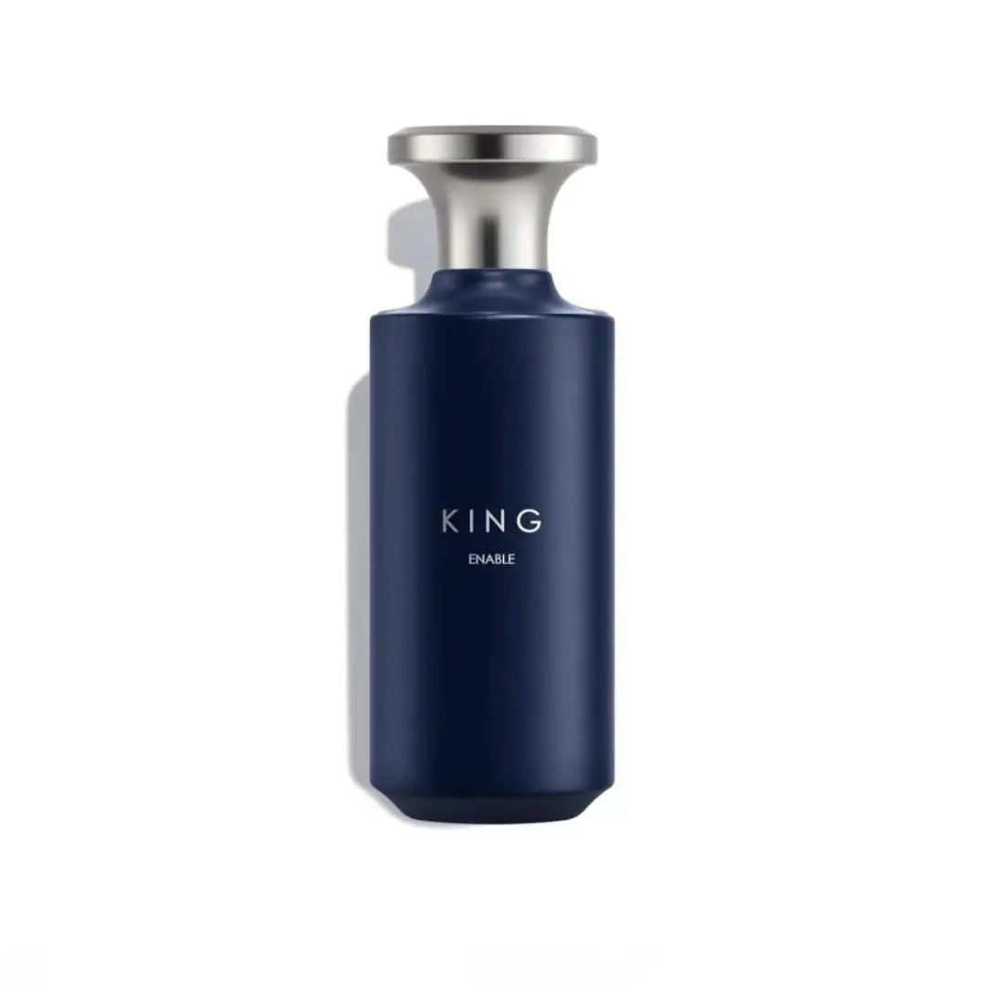 'King Enable' navy blue perfume bottle with silver cap on a white background with 'Assaf' branding
