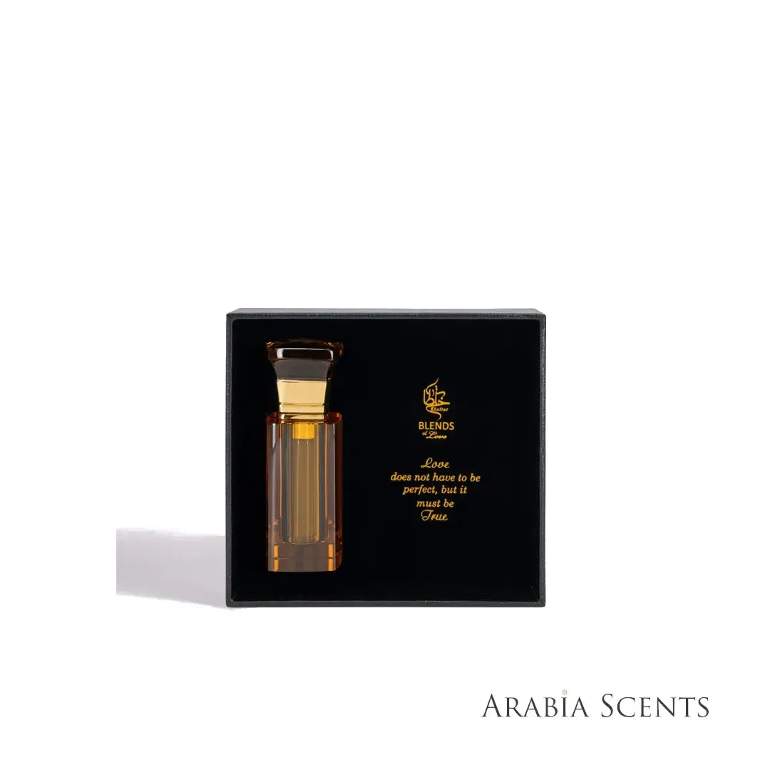 Love In Drops Mukhamariya golden Oil bottle and packaging on a white background by Khaltat Blends of Love featured on 'ArabiaScents'