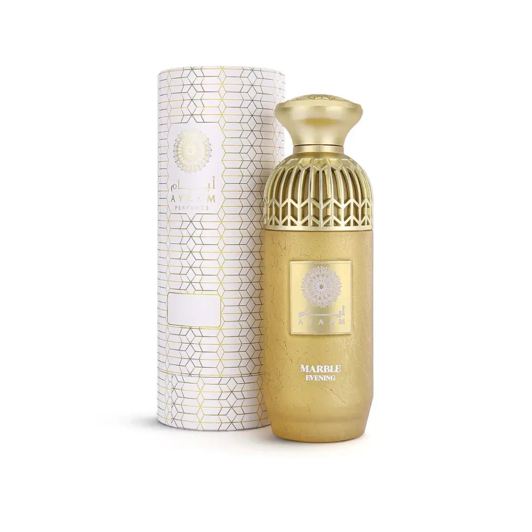 'Marble Evening' gold perfume bottle with geometric design and matching packaging on a white background with 'Ayaam' branding