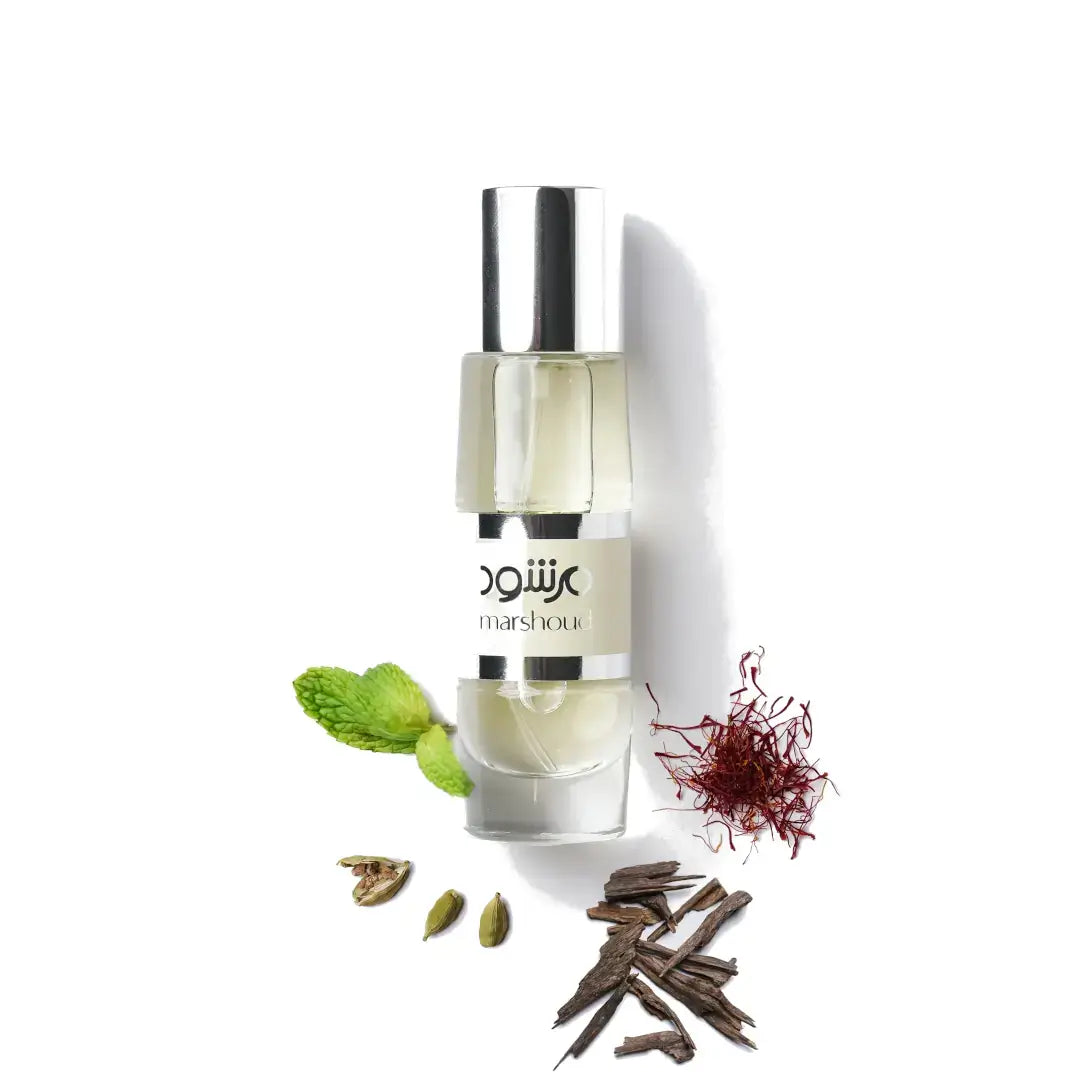 Marshoud 4 White Perfume bottle with herbs and spices on a white background with Atyab Al Marshoud branding