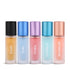 Five Micro Musk bottles with colored caps and names on a white background branded Ayaam