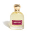 Perfume bottle labeled 'Midnight Bloom Emirates Pride' with a gold cap on a white background