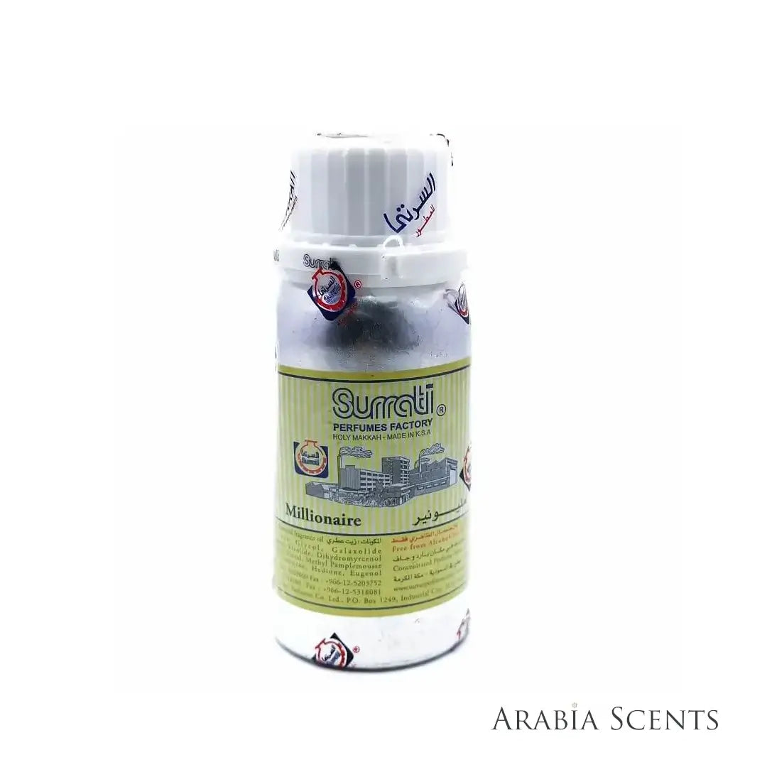 A bottle of Surrati Millionaire perfume oil with a white cap and a light green label, shown on a white background featured on 'ARABIASCENTS'