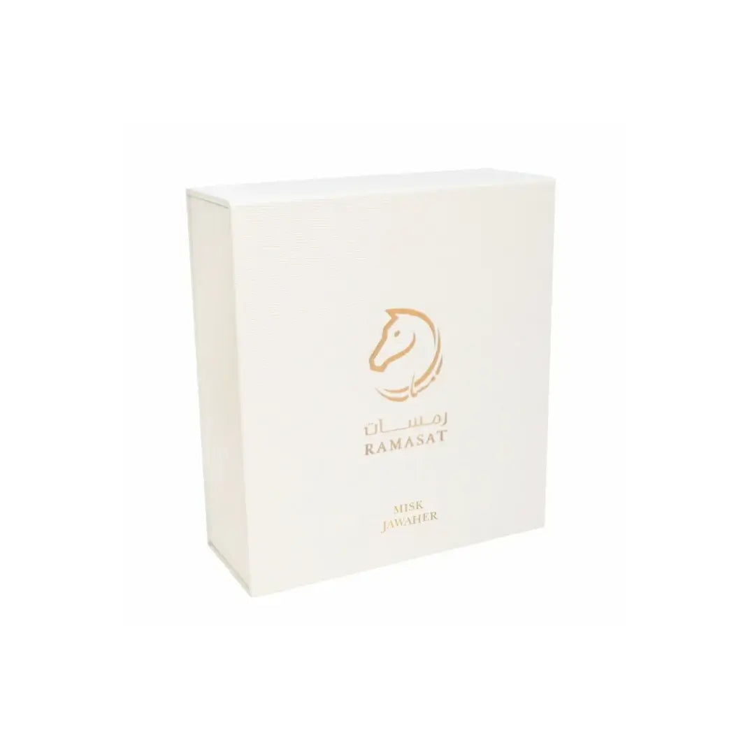 'Misk Jawareh' perfume packaging on a white background with 'Ramasat' branding