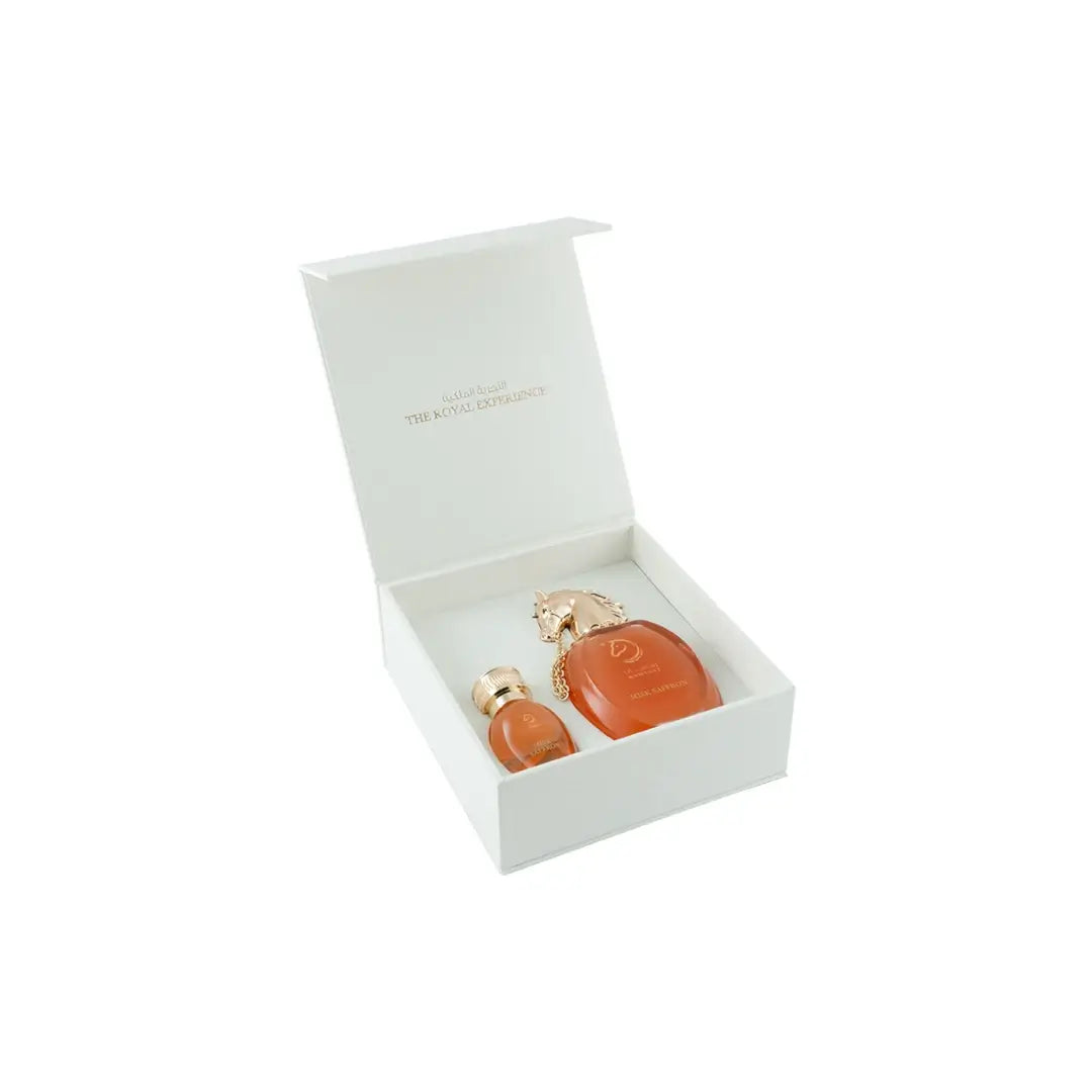 'Misk Saffron' perfume bottle with horse-shaped cap & packaging on a white background with 'Ramasat' branding