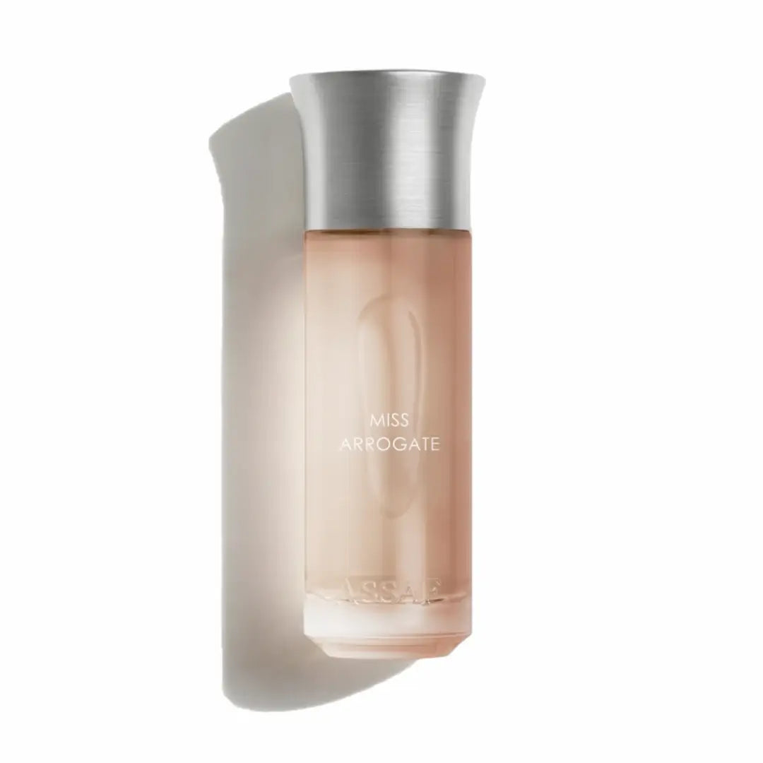 'Miss Arrogate' perfume bottle on a white background with 'Assaf' branding