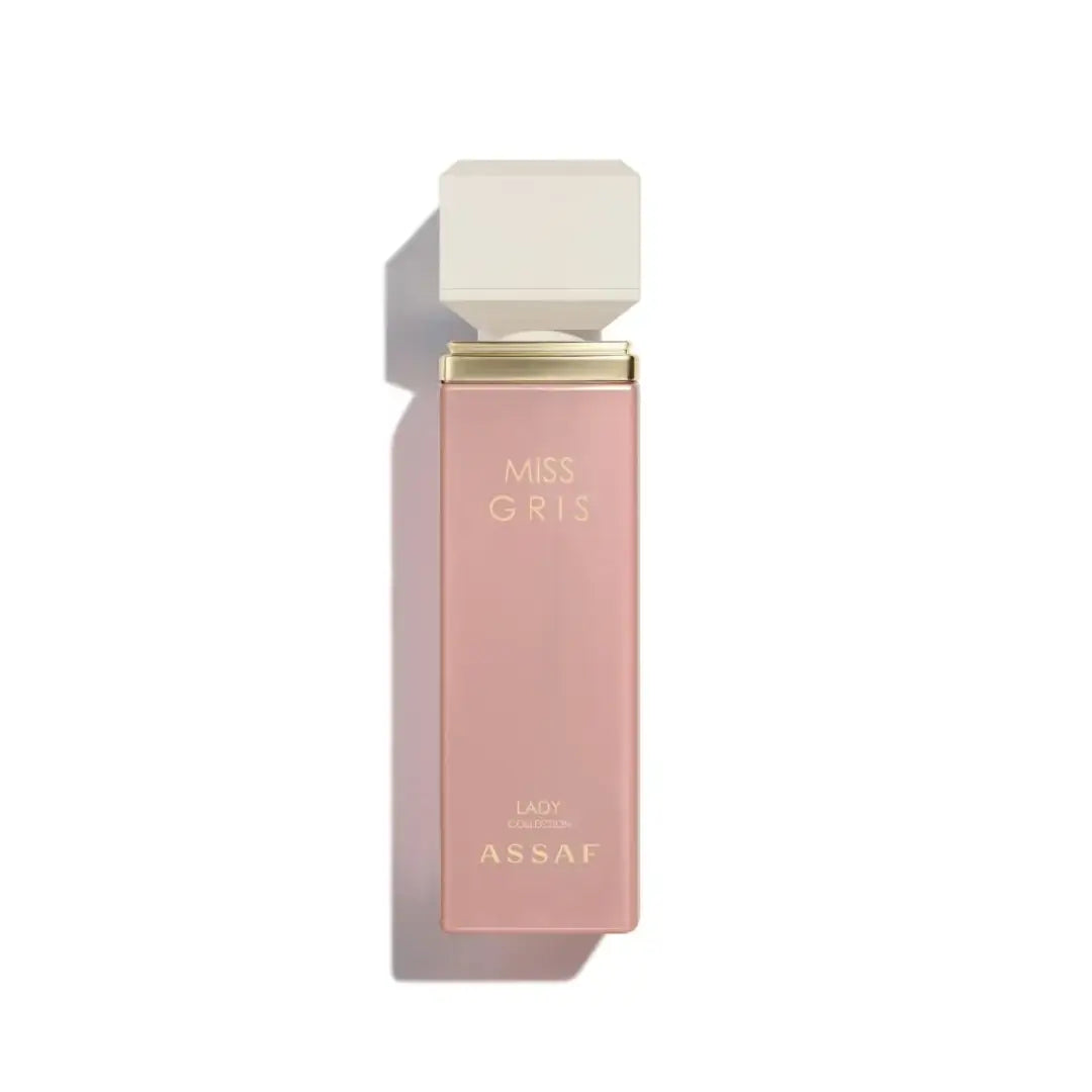 Pink perfume bottle labelled 'Miss Gris' with gold cap on a white background with Assaf branding