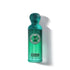 'Momento' Green perfume bottle with decorative cap on a white background with Gissah branding