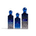 Three blue perfume bottles labeled 'Half Moon', 'Crescent Moon', and 'Full Moon' on a white background with Ibraq branding