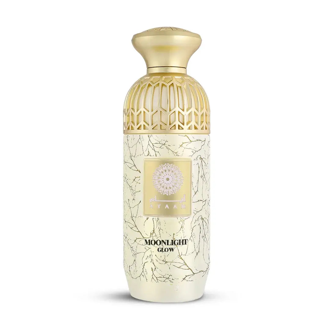 'Moonlight Glow' perfume in a decorative bottle with gold cap and floral design on a white background with 'Ayaam' branding