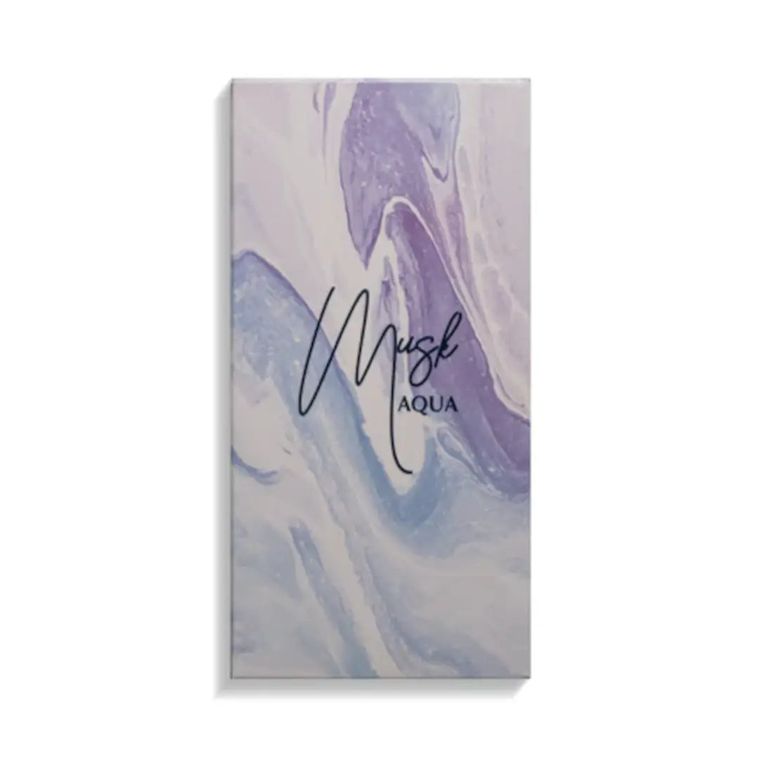 'Musk Aqua' perfume packaging on a white background with 'Junaid' branding