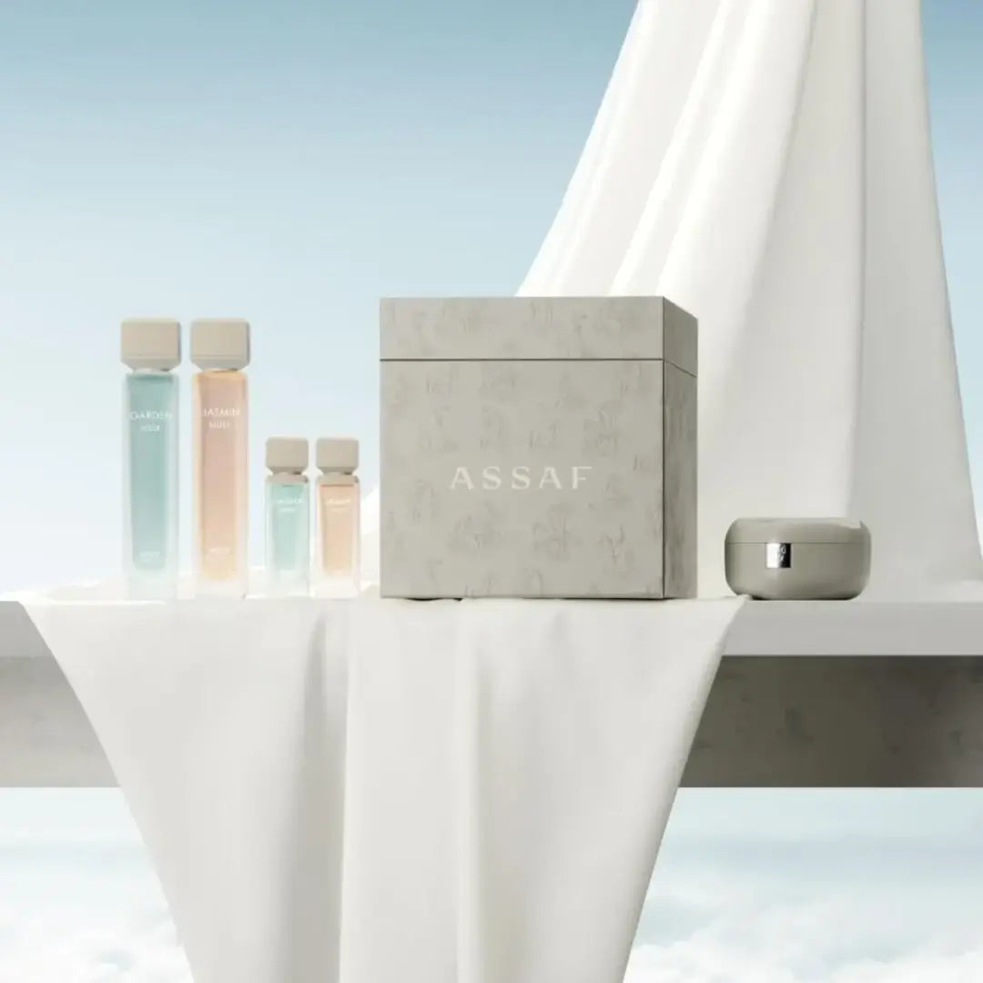 'Musk Assaf Collection' set products on a white surface with a light blue background with 'Assaf' branding