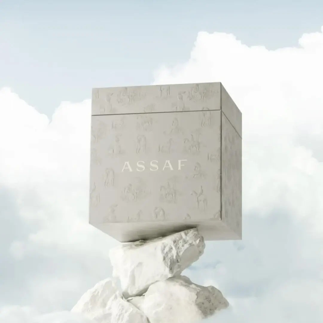 'Musk Assaf Collection' square box with 'ASSAF' branding on a cloud background